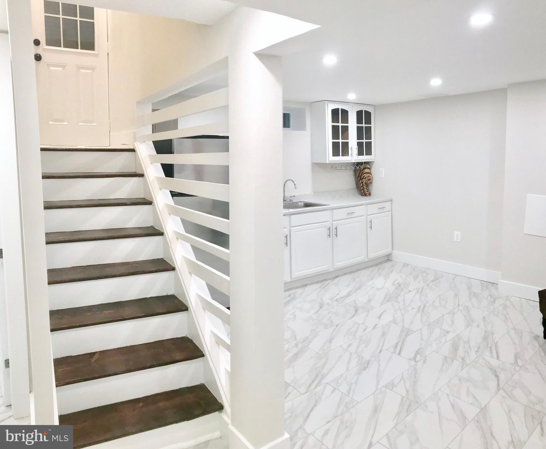 4202 Round Hill Road Silver Spring, MD 20906 - Photo 14 of 30 Side Entrance steps down to lower level