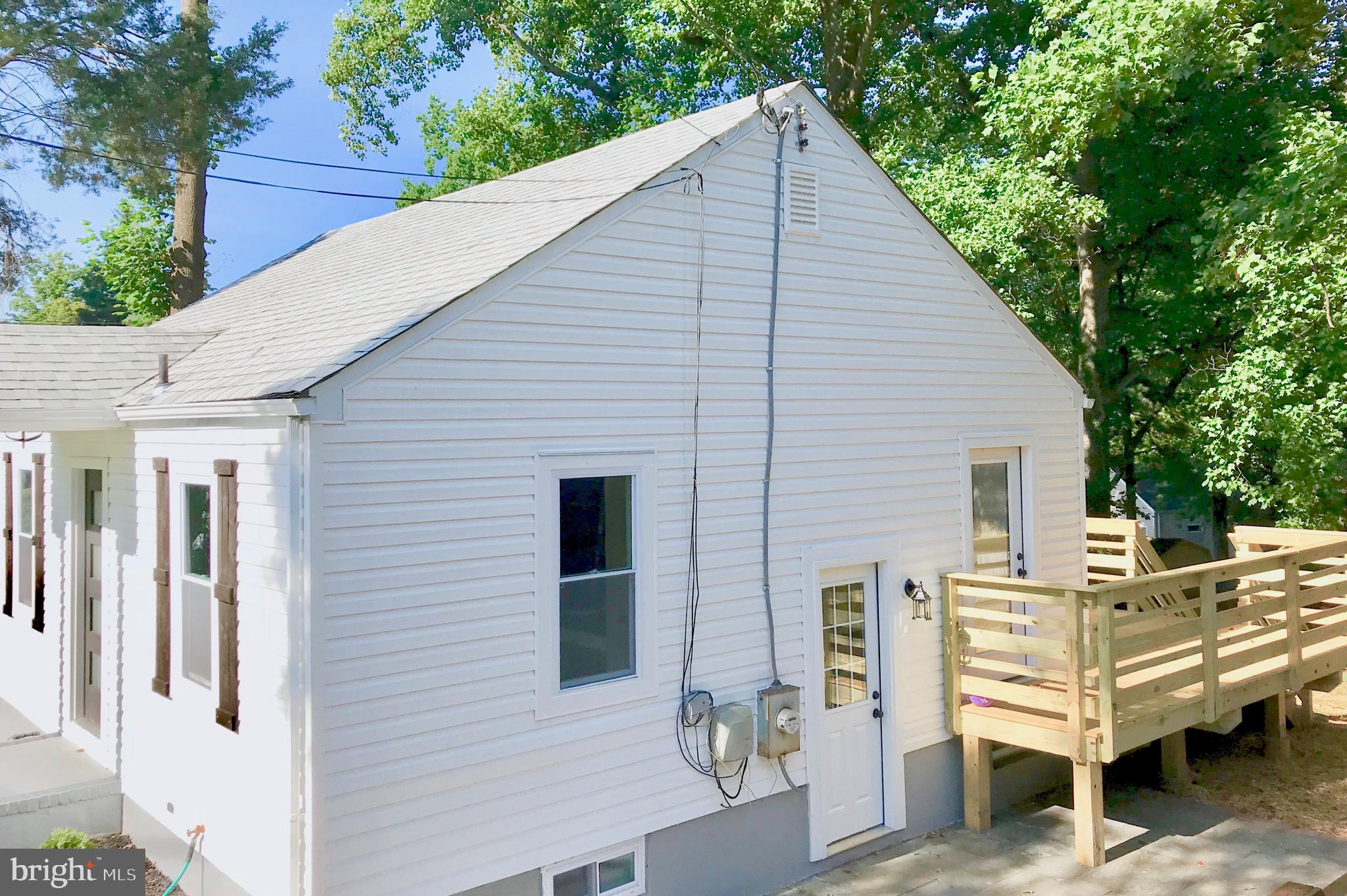 4202 Round Hill Road Silver Spring, MD 20906 - Photo 3 of 30 Side Entrance with patio and brand new deck