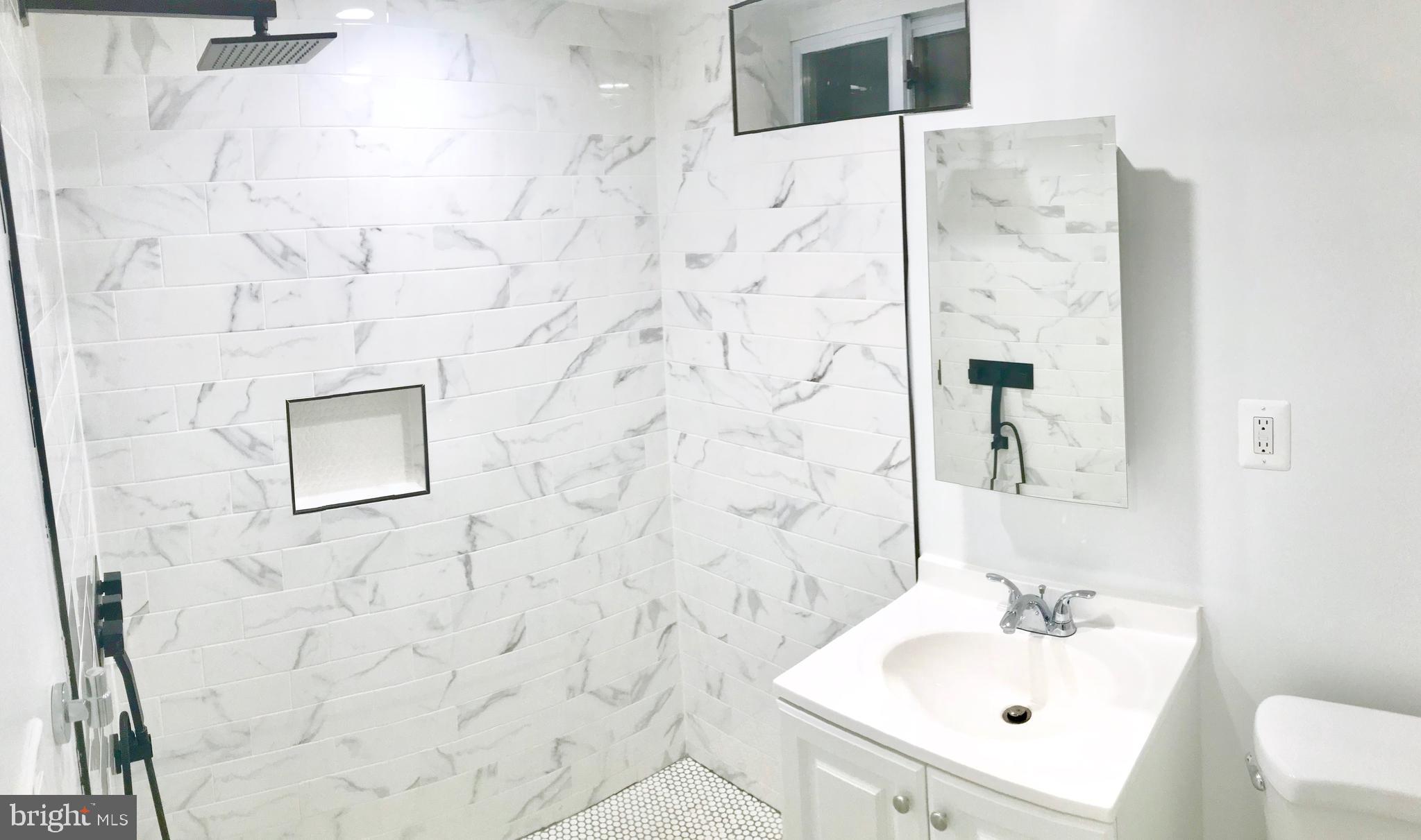 4202 Round Hill Road Silver Spring, MD 20906 - Photo 23 of 30 Lower level Full Bath -- brand new!
