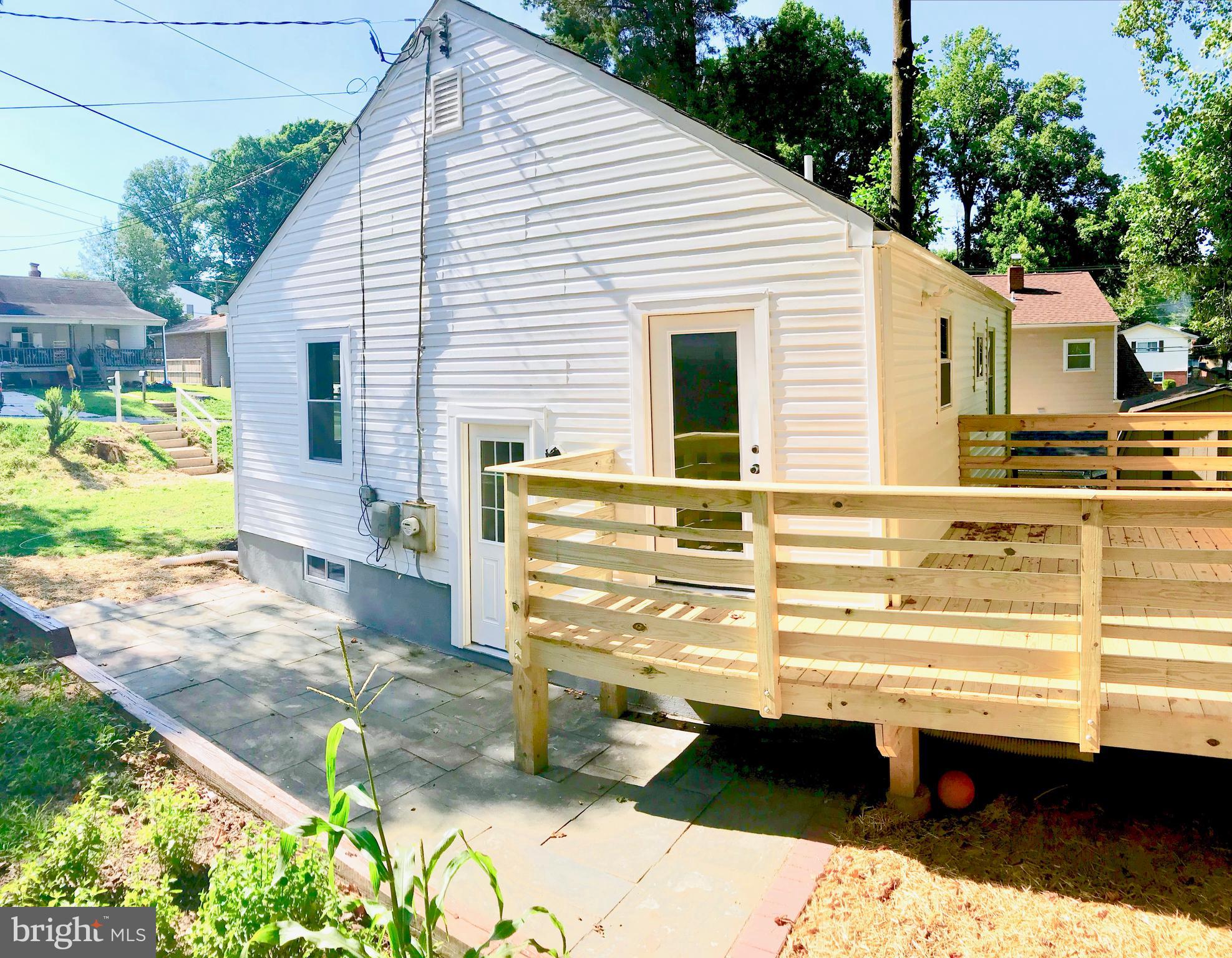 4202 Round Hill Road Silver Spring, MD 20906 - Photo 26 of 30 Side deck and patio area