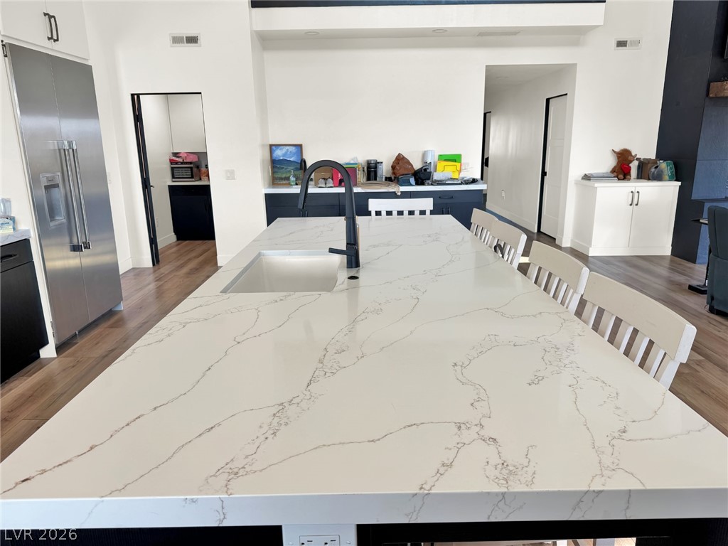 9393 North 93rd Highway Caliente, NV 89008 - Photo 25 of 41 A spacious kitchen island with a clean, modern aesthetic, ideal for entertaining and daily meals.