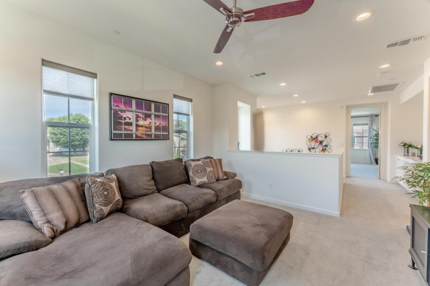 767 Sullivan Way Gilroy, CA 95020 - Photo 14 of 37 a living room with furniture and a large window