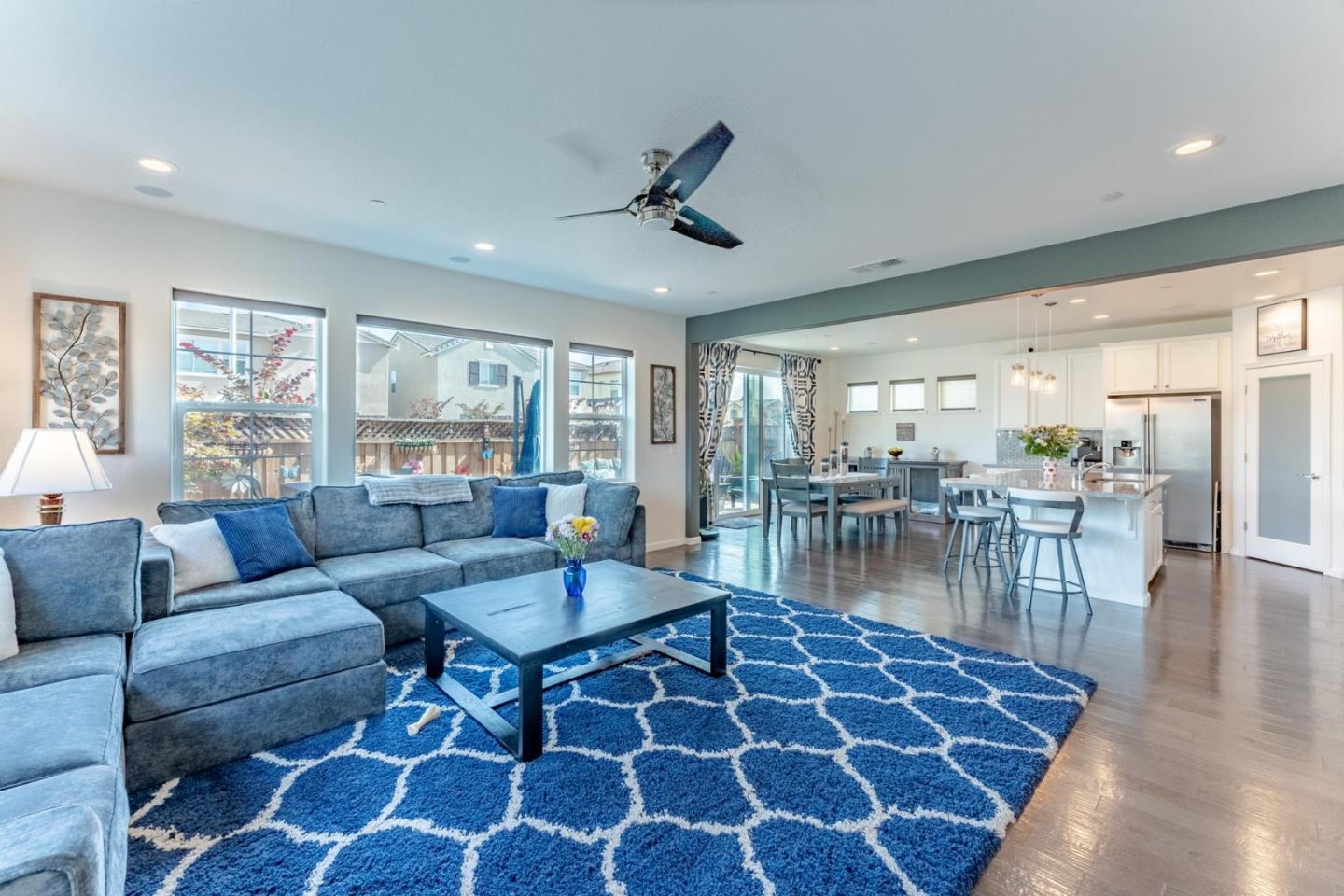 767 Sullivan Way Gilroy, CA 95020 - Photo 6 of 37 a living room with furniture and a floor to ceiling window