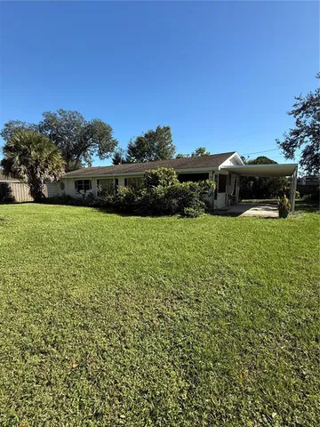 a view of a garden with houses