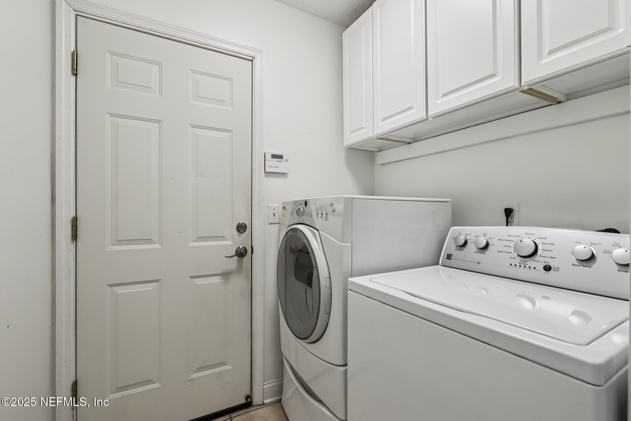333 Stokes Creek Drive St. Augustine, FL 32095 - Photo 25 of 68 a utility room with dryer and washer