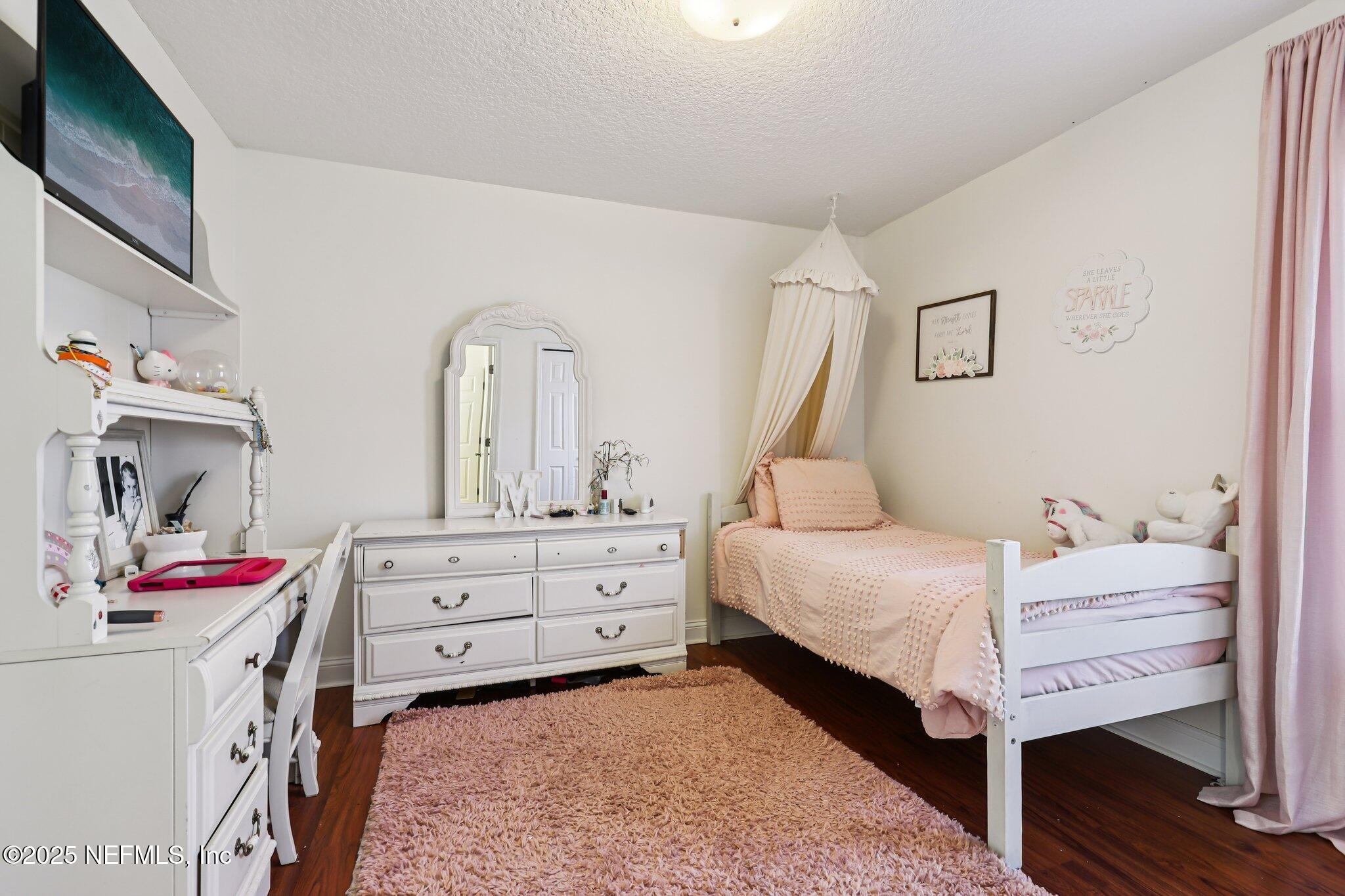 333 Stokes Creek Drive St. Augustine, FL 32095 - Photo 26 of 68 a bedroom with a bed and a dresser