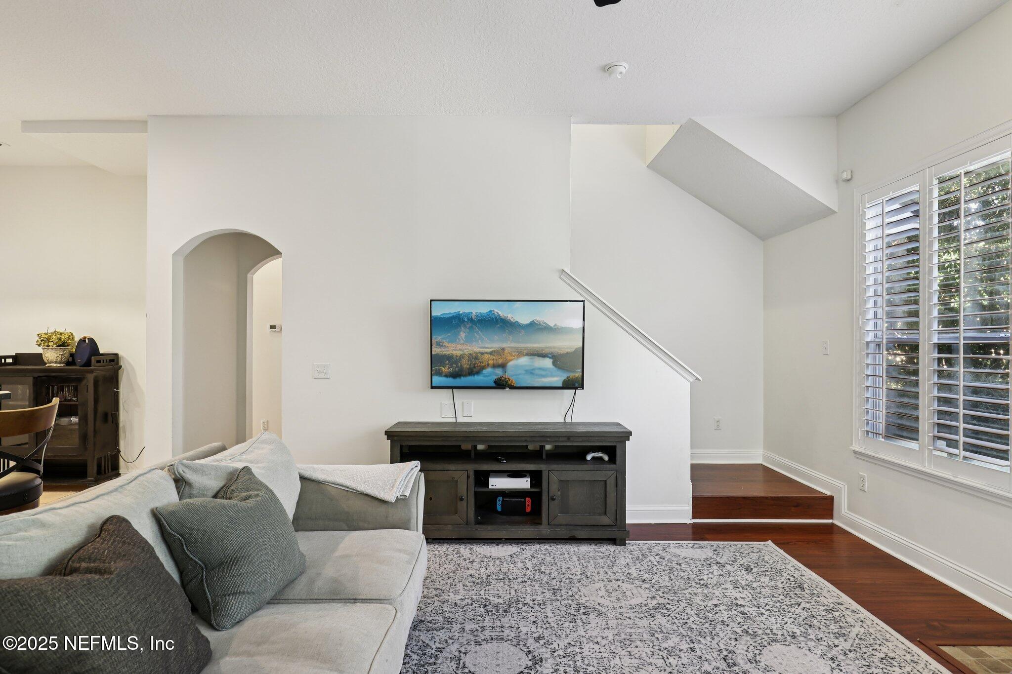 333 Stokes Creek Drive St. Augustine, FL 32095 - Photo 10 of 68 a living room with furniture and a rug