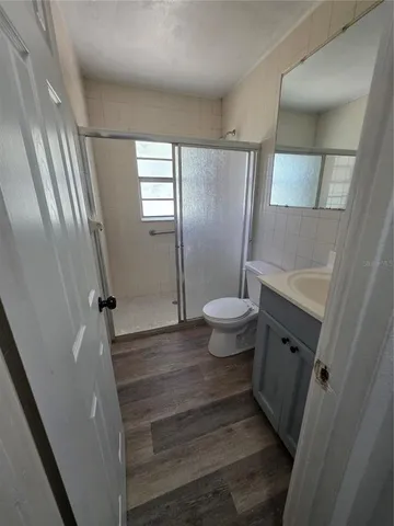 a bathroom with a sink and toilet