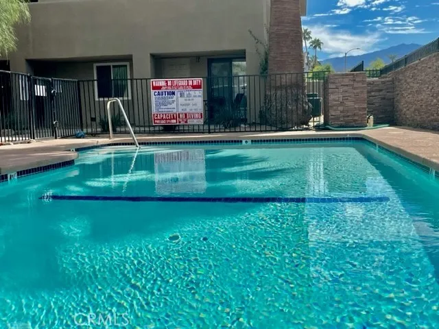 a view of a house with a swimming pool