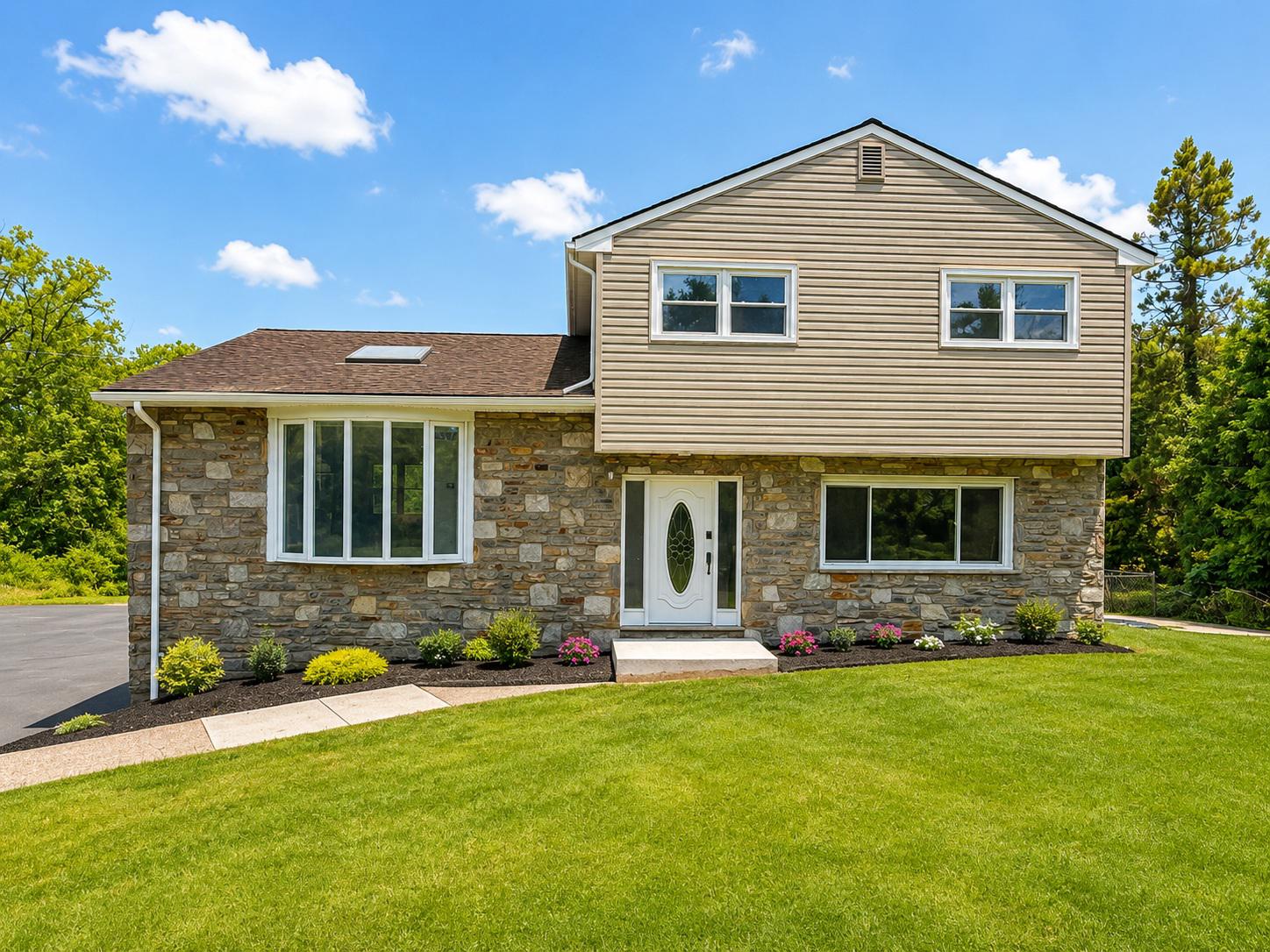 1104 Church Road Wyncote, PA 19095 - Photo 2 of 31 a front view of house with yard and outdoor seating