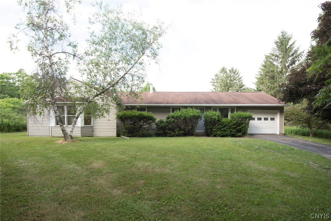 1907 East Lake Road Spafford, NY 13152 - Photo 1 of 1 Exterior Front. Although not in bloom presently t