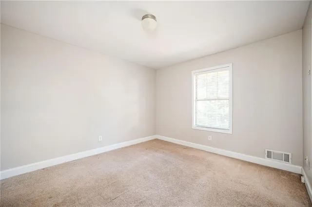 an empty room with a window