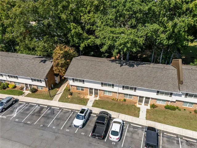 a view of a swimming pool with a patio