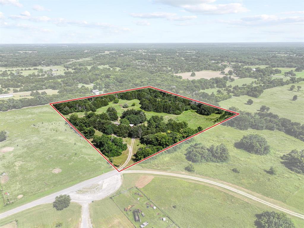 252 Meadow Lake Estates Road Denison, TX 75021 - Photo 29 of 37 Expansive parcel featuring a mix of mature trees and open grassy areas