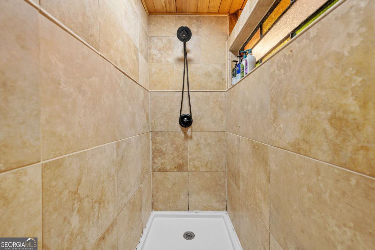 120 Community Hill Drive Blue Ridge, GA 30513 - Photo 21 of 57 a bathroom with a shower