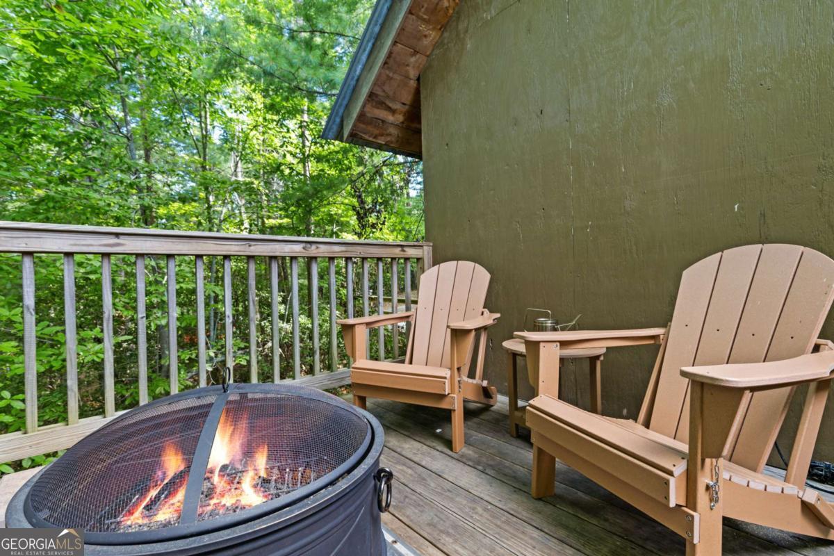 120 Community Hill Drive Blue Ridge, GA 30513 - Photo 44 of 57 a view of a chairs in balcony