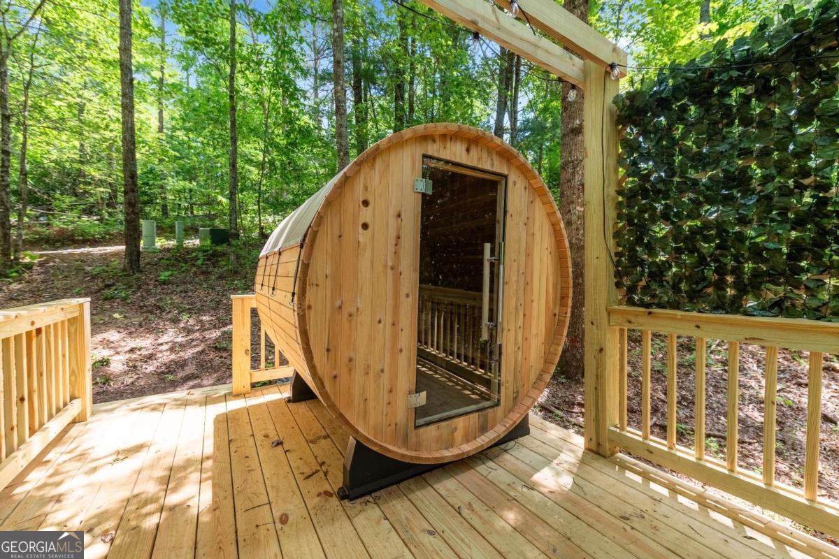 120 Community Hill Drive Blue Ridge, GA 30513 - Photo 5 of 57 a view of balcony with wooden floor and fence