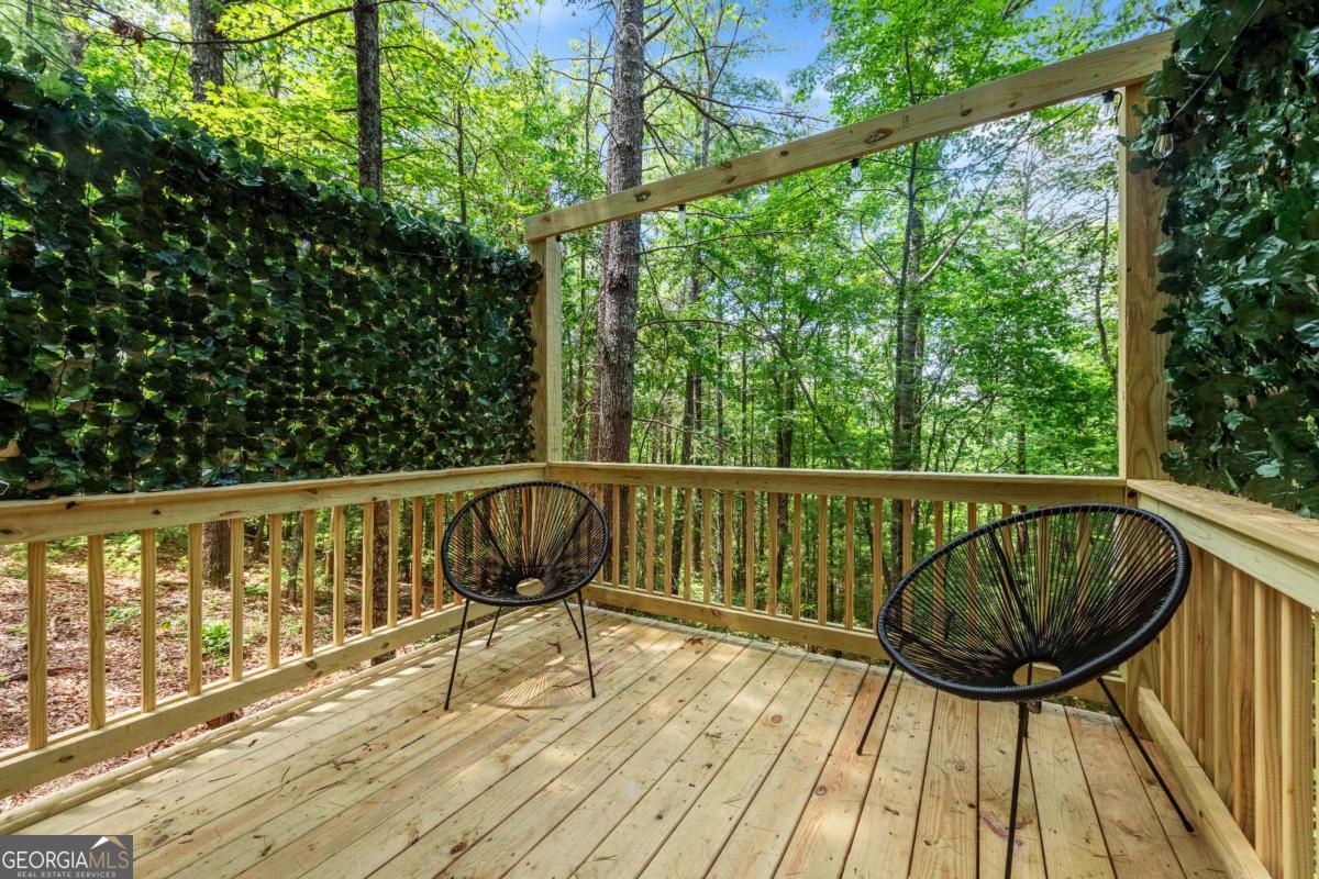 120 Community Hill Drive Blue Ridge, GA 30513 - Photo 54 of 57 a view of balcony with wooden floor and fence