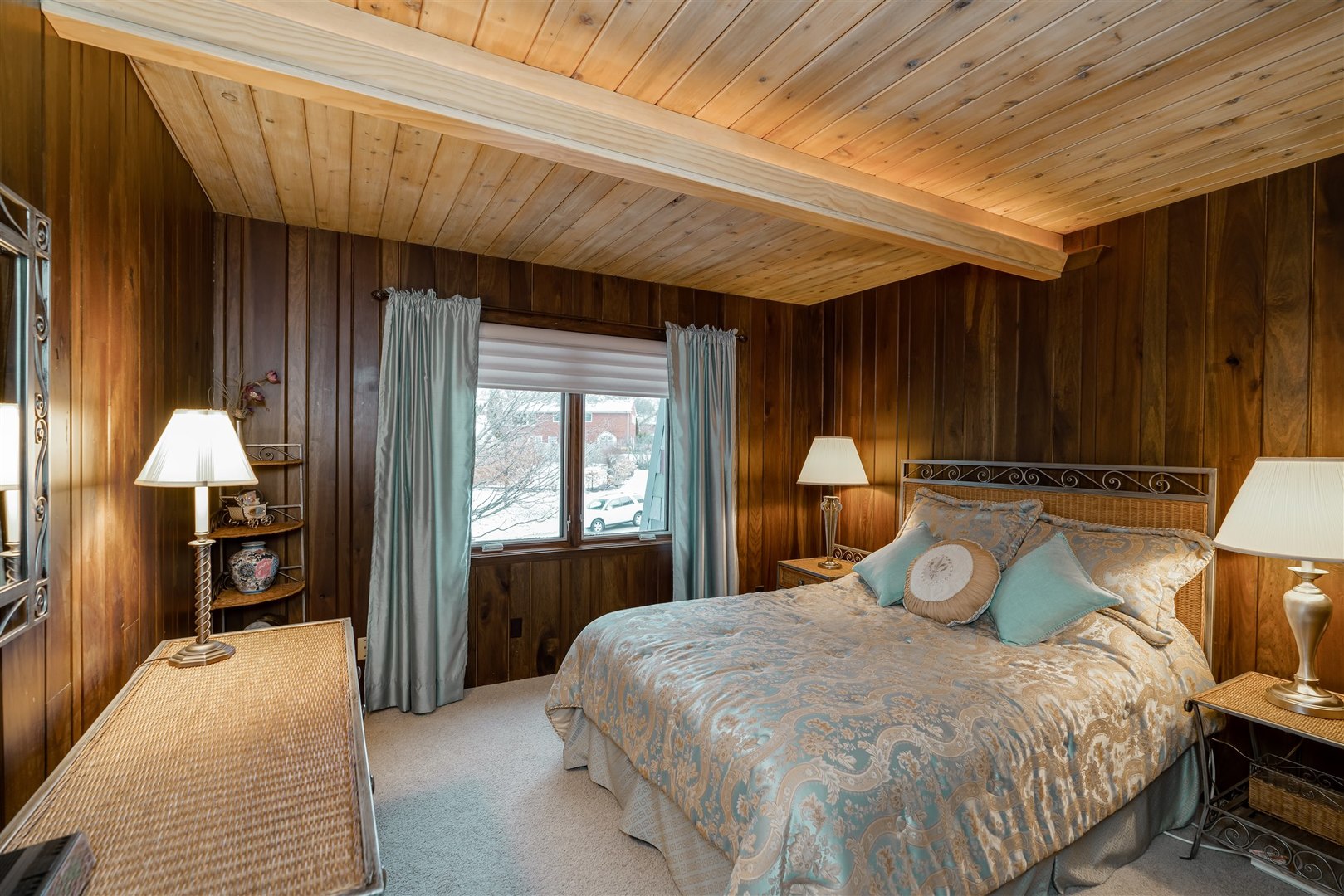 219 Parkview Drive Bloomington, IL 61701 - Photo 39 of 60 a bedroom with a bed and a chandelier