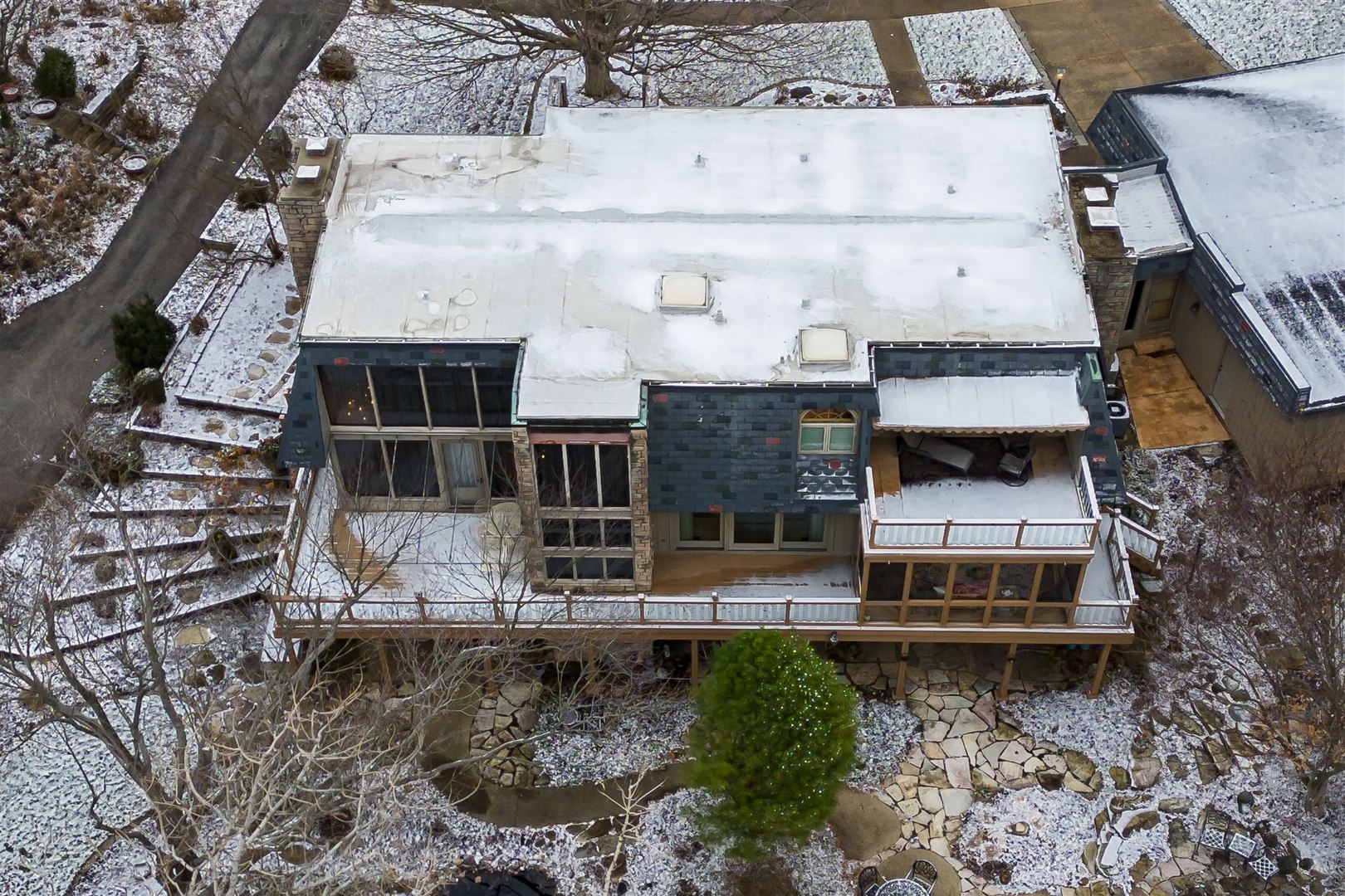219 Parkview Drive Bloomington, IL 61701 - Photo 59 of 60 a house with tall trees in front of it