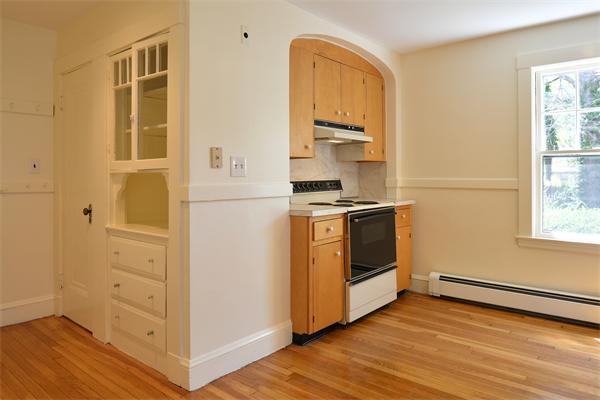 6 Lindbergh Road Marblehead, MA 01945 - Photo 5 of 9 a kitchen with a stove and a refrigerator