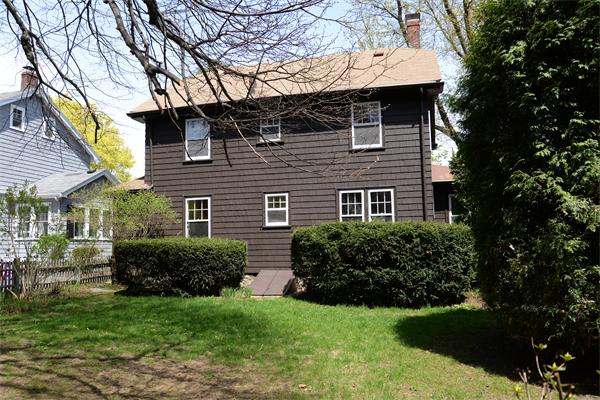 6 Lindbergh Road Marblehead, MA 01945 - Photo 8 of 9 a view of a brick house with a yard
