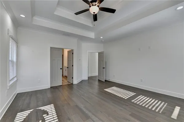 a view of a balcony with wooden floor