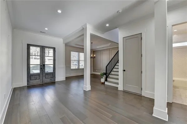 a open kitchen with sink and cabinets