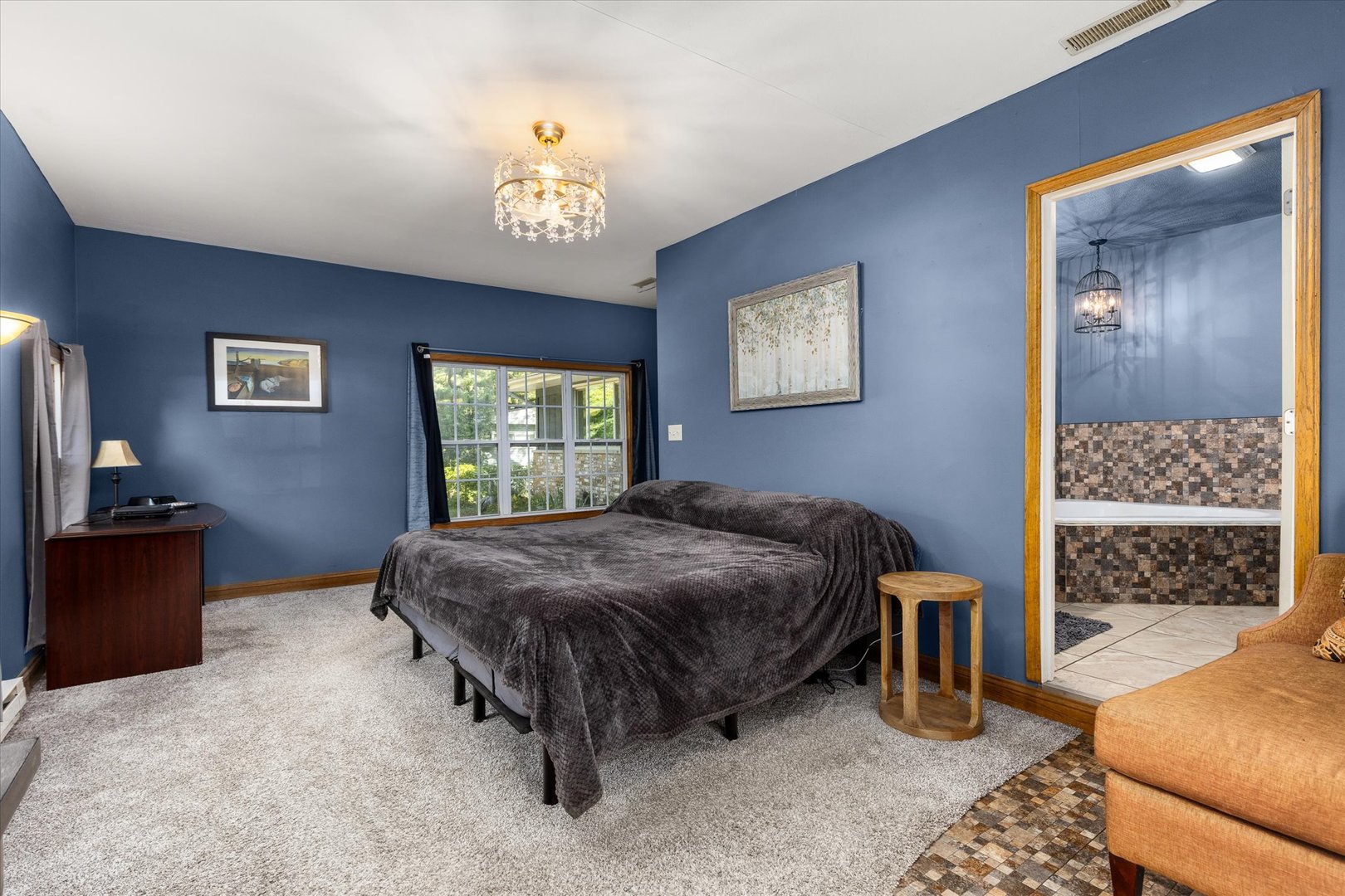 3440 Cardinal Lane Morris, IL 60450 - Photo 19 of 34 a spacious bedroom with a bed and a dresser in it