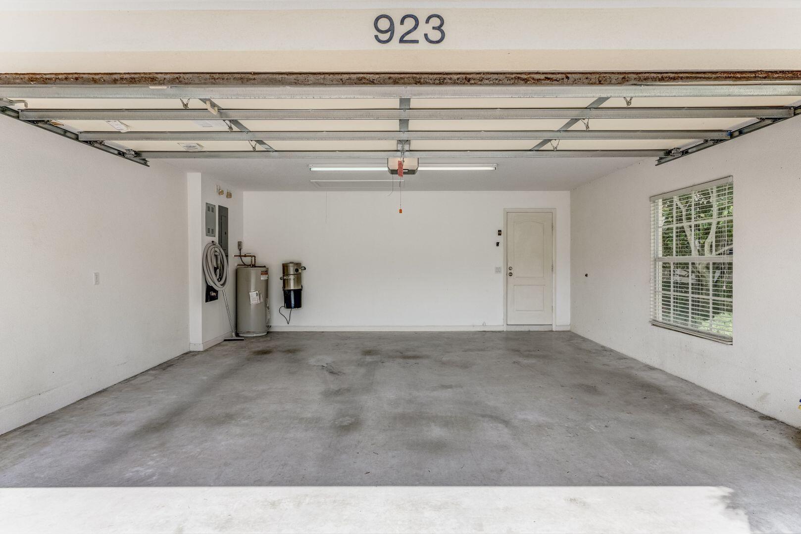 923 Magdalena Road Palm Beach Gardens, FL 33410 - Photo 31 of 47 a view of a garage