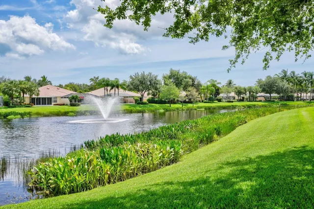 a view of a lake with a yard