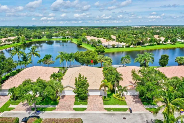 a view of a lake with a building in the background