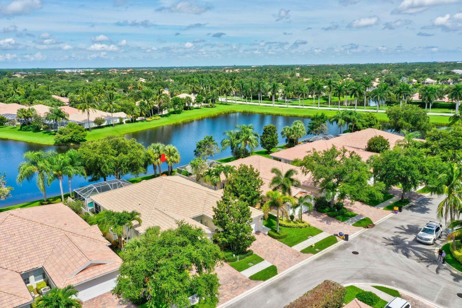 923 Magdalena Road Palm Beach Gardens, FL 33410 - Photo 39 of 47 a view of a garden with an outdoor space