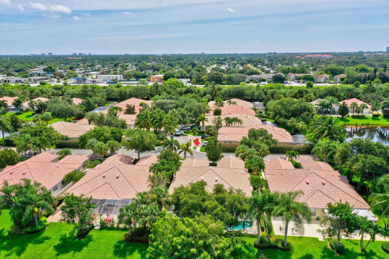 923 Magdalena Road Palm Beach Gardens, FL 33410 - Photo 41 of 47 an aerial view of a city with lots of residential buildings