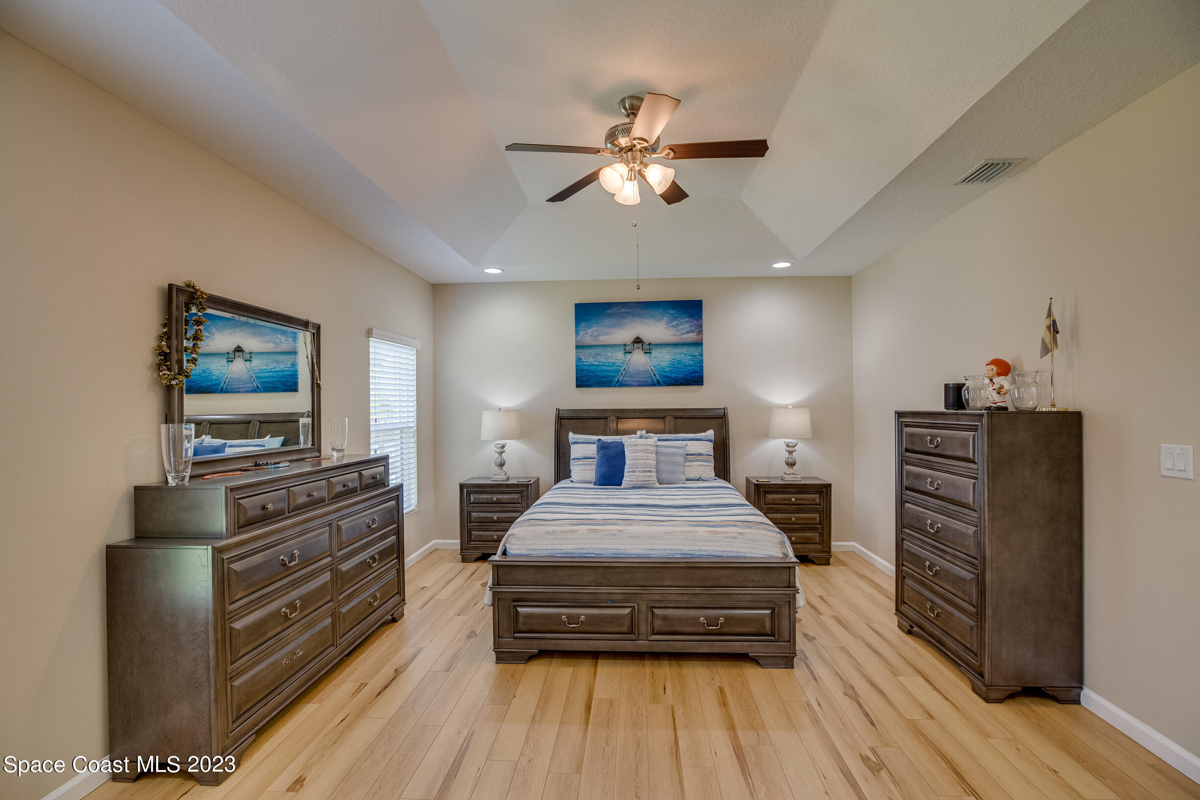 Undisclosed Address Melbourne, FL 32901 - Photo 29 of 53 a bedroom with bed and wooden floor