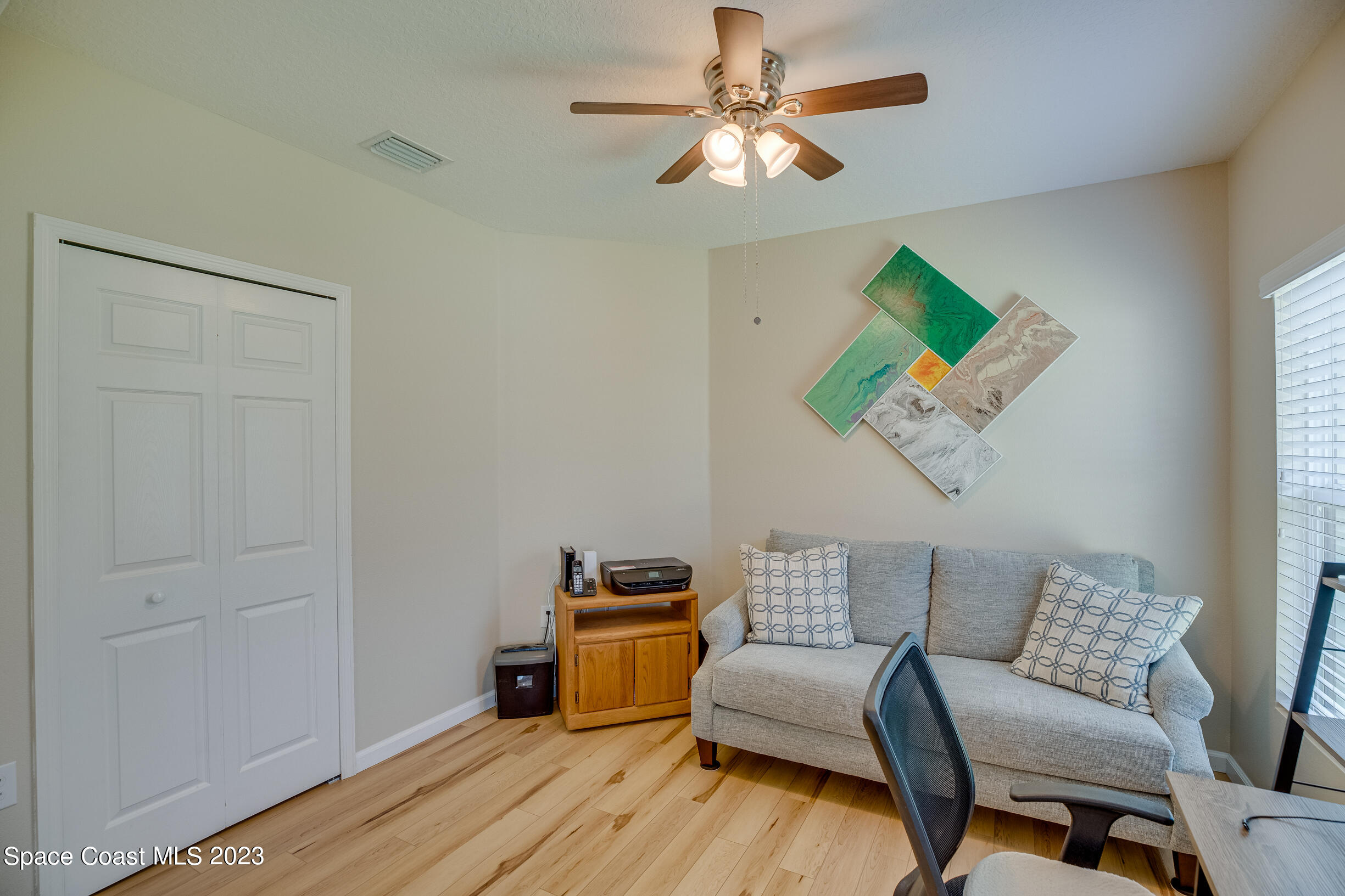 Undisclosed Address Melbourne, FL 32901 - Photo 31 of 53 a living room with furniture