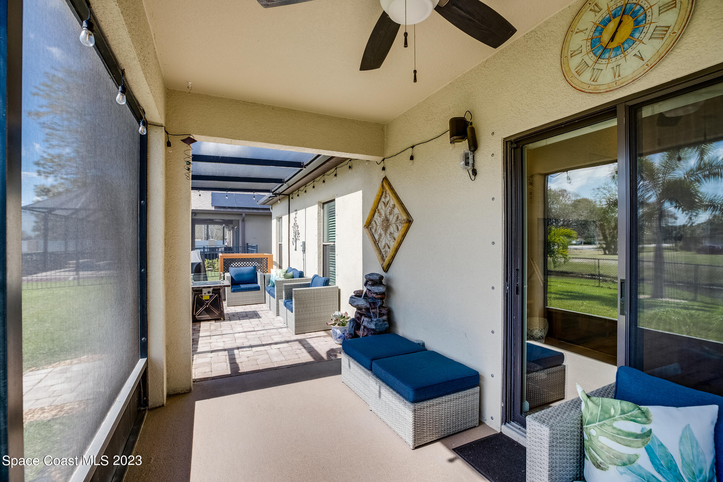 Undisclosed Address Melbourne, FL 32901 - Photo 41 of 53 a living room with furniture and a floor to ceiling window