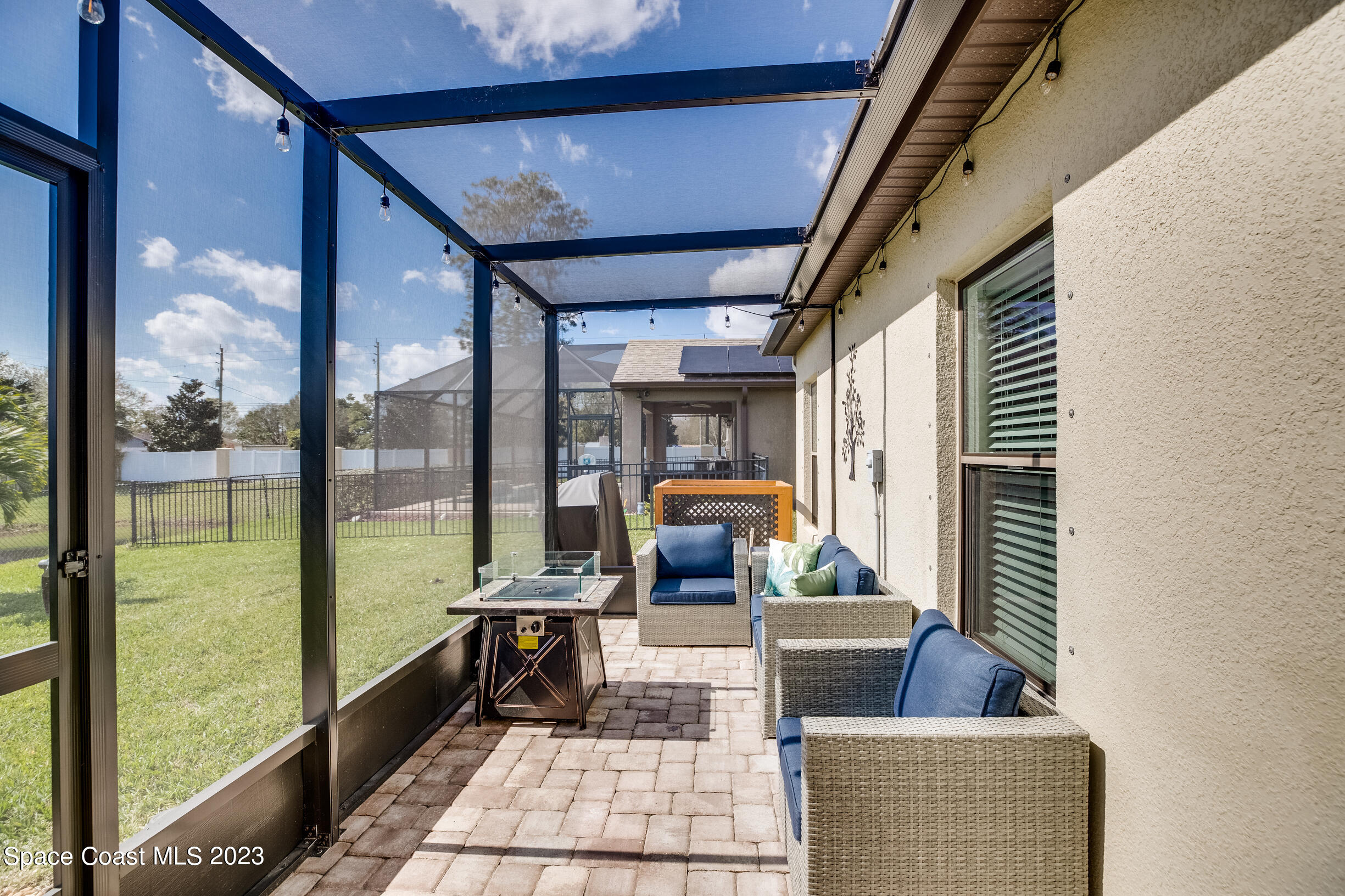 Undisclosed Address Melbourne, FL 32901 - Photo 42 of 53 a living room with furniture and a floor to ceiling window