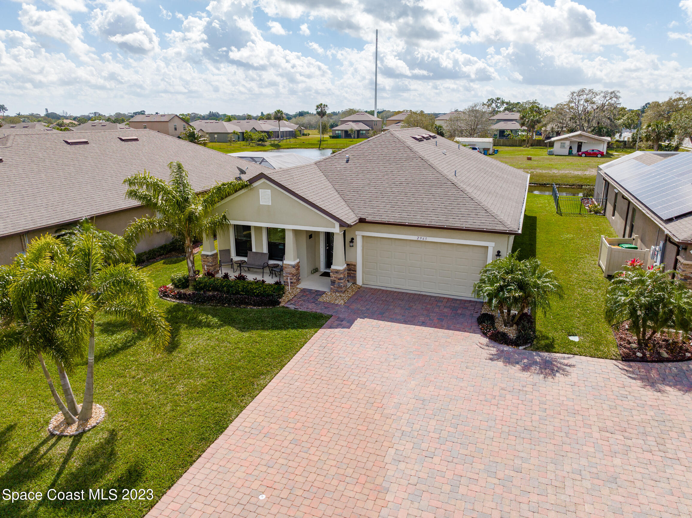 Undisclosed Address Melbourne, FL 32901 - Photo 46 of 53 a front view of a house with garden