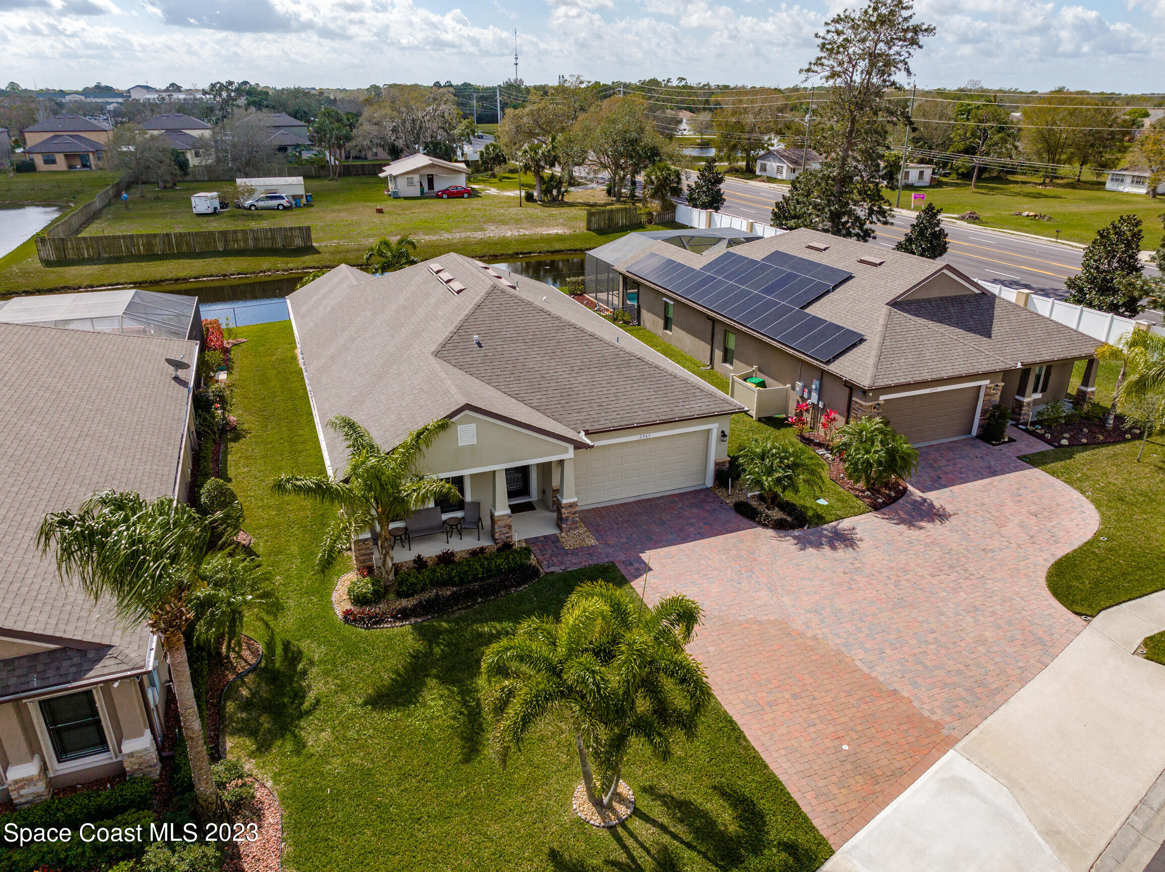 Undisclosed Address Melbourne, FL 32901 - Photo 48 of 53 an aerial view of a house with a garden