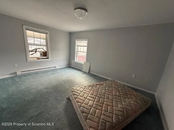 an empty room with windows