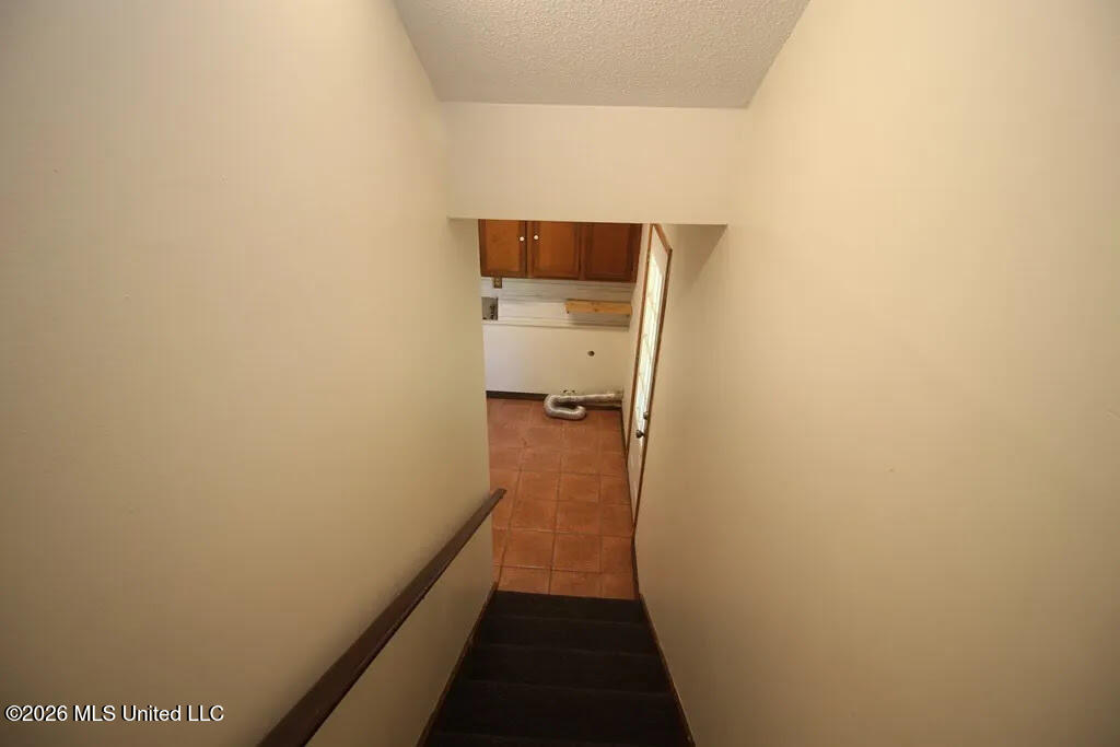 1809 Wansley Road Laurel, MS 39443 - Photo 18 of 27 Downstairs to Laundry Room/Garage