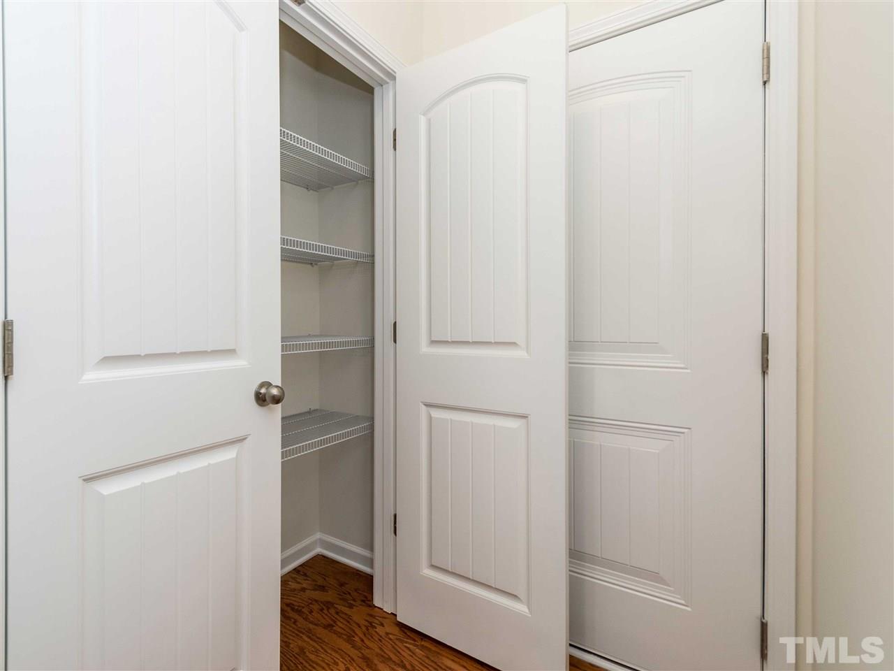 76 Springhill Lane Garner, NC 27529 - Photo 10 of 25 Great location for this pantry as it is located to your right as you walk into the kitchen from the garage.