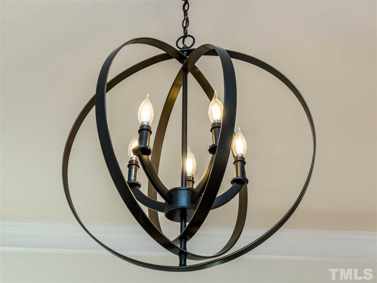 76 Springhill Lane Garner, NC 27529 - Photo 5 of 25 Beautiful light fixture in this Dining Room.
