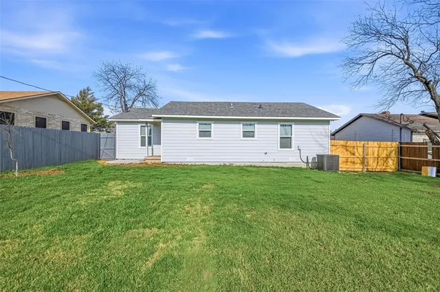 a front view of house with yard and seating area
