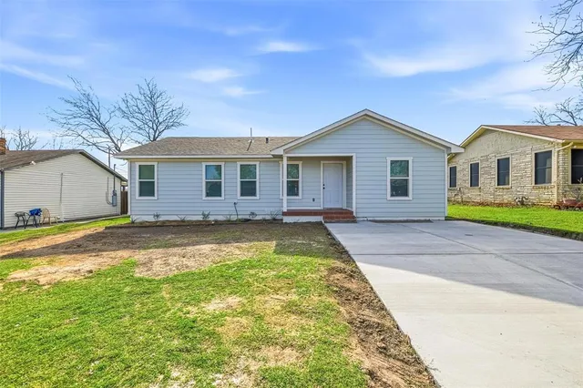 a view of a house with a swimming pool
