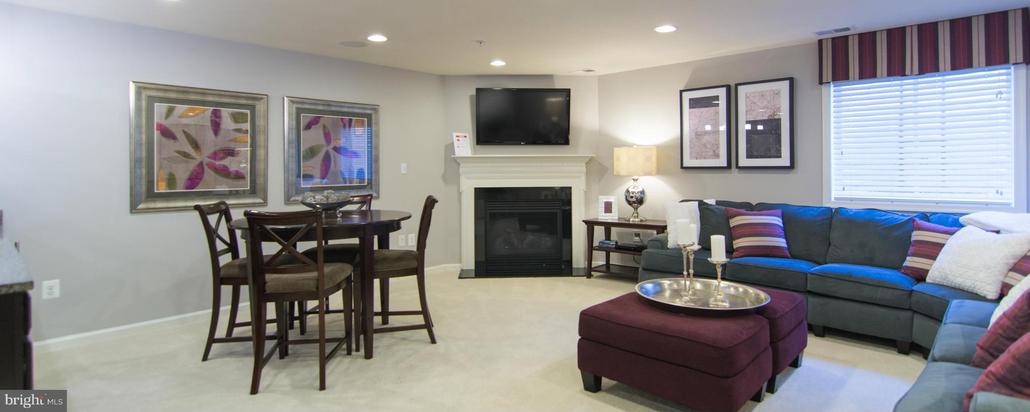 7635 Telamon Way Hanover, MD 21076 - Photo 10 of 30 a living room with furniture fireplace and window