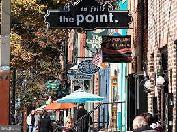 7635 Telamon Way Hanover, MD 21076 - Photo 15 of 30 a street sign on a street corner