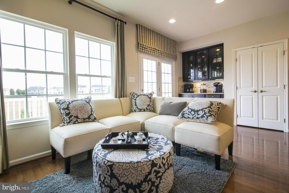 7635 Telamon Way Hanover, MD 21076 - Photo 5 of 30 a living room with furniture and a large window