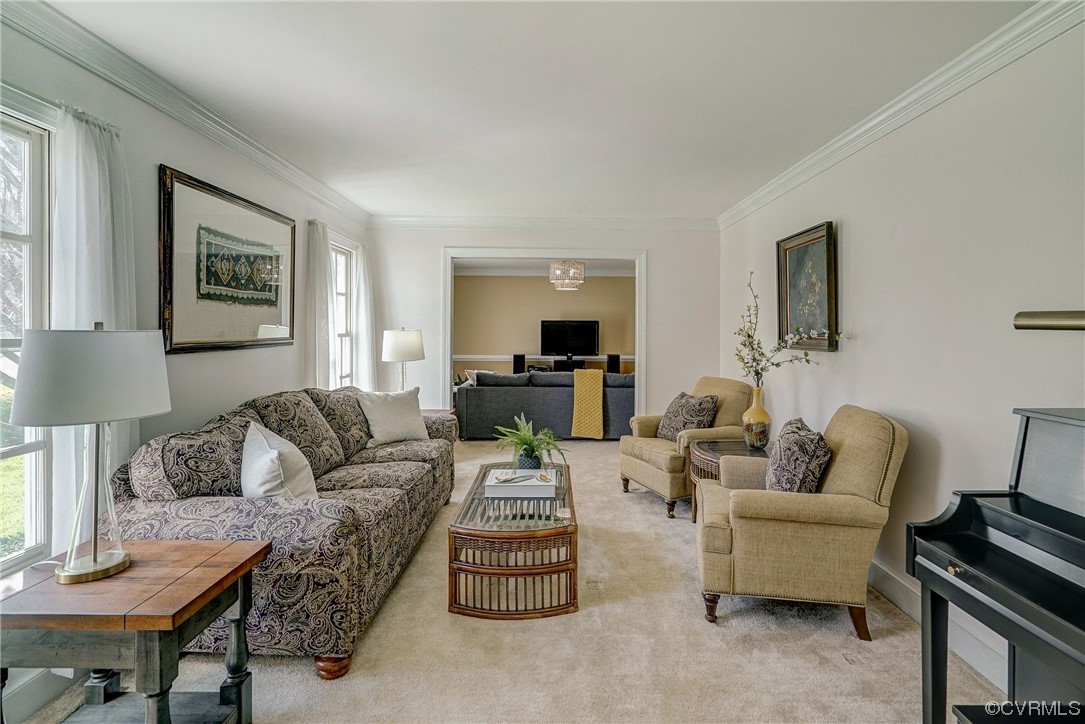 10206 Sioux Road Richmond, VA 23235 - Photo 10 of 40 a living room with furniture and a lamp